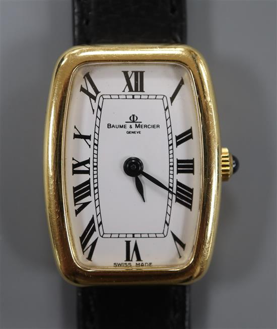 A lady's 18ct yellow metal Baume & Mercier manual wind wrist watch, with Roman dial.